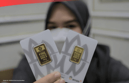 Harga emas batangan 24 karat Antam kembali turun pada perdagangan hari ini./(Sumber Foto: JIBI/Bisnis/Fanny Kusumawardhani)