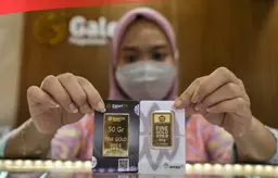 Perbedaan emas Antam dan UBS dapat dilihat dari produsen, sertifikat, ukuran produk, harga, dan lokasi pembeliannya./ (Sumber foto: JIBI/Bisnis/Suselo Jati)