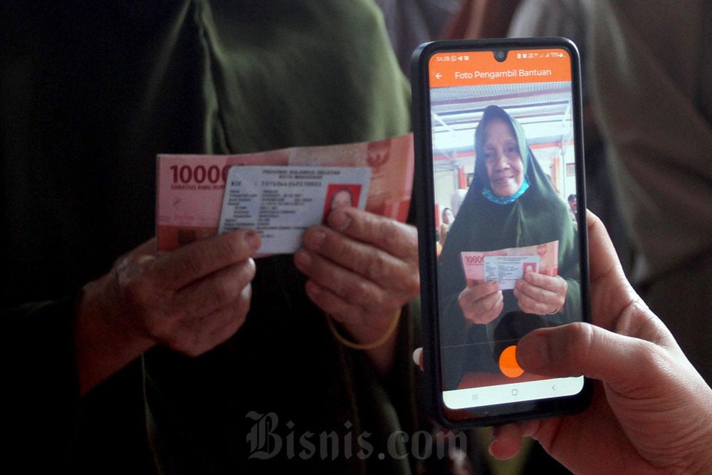 Ilustrasi Kabar BLT Kesra Rp 900 Ribu Agustus 2026 ./(Sumber foto: JIBI/Bisnis/Paulus Tandi Bone)